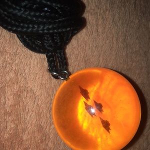 A dragon ball necklace about Goku 4th dragon ball Z sphere